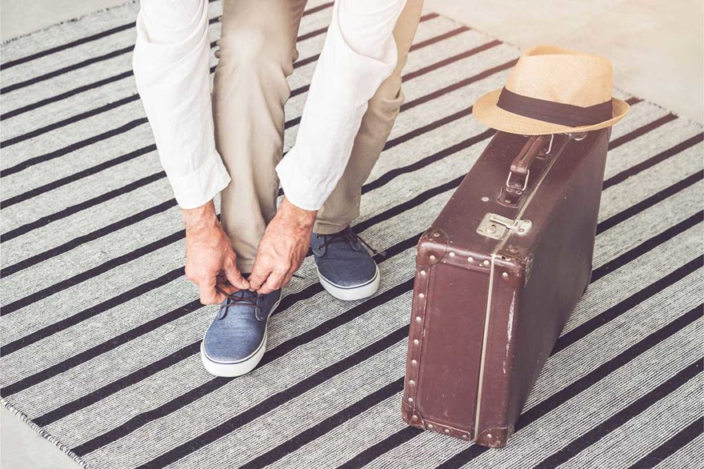 Man and luggage image for Pure Shave